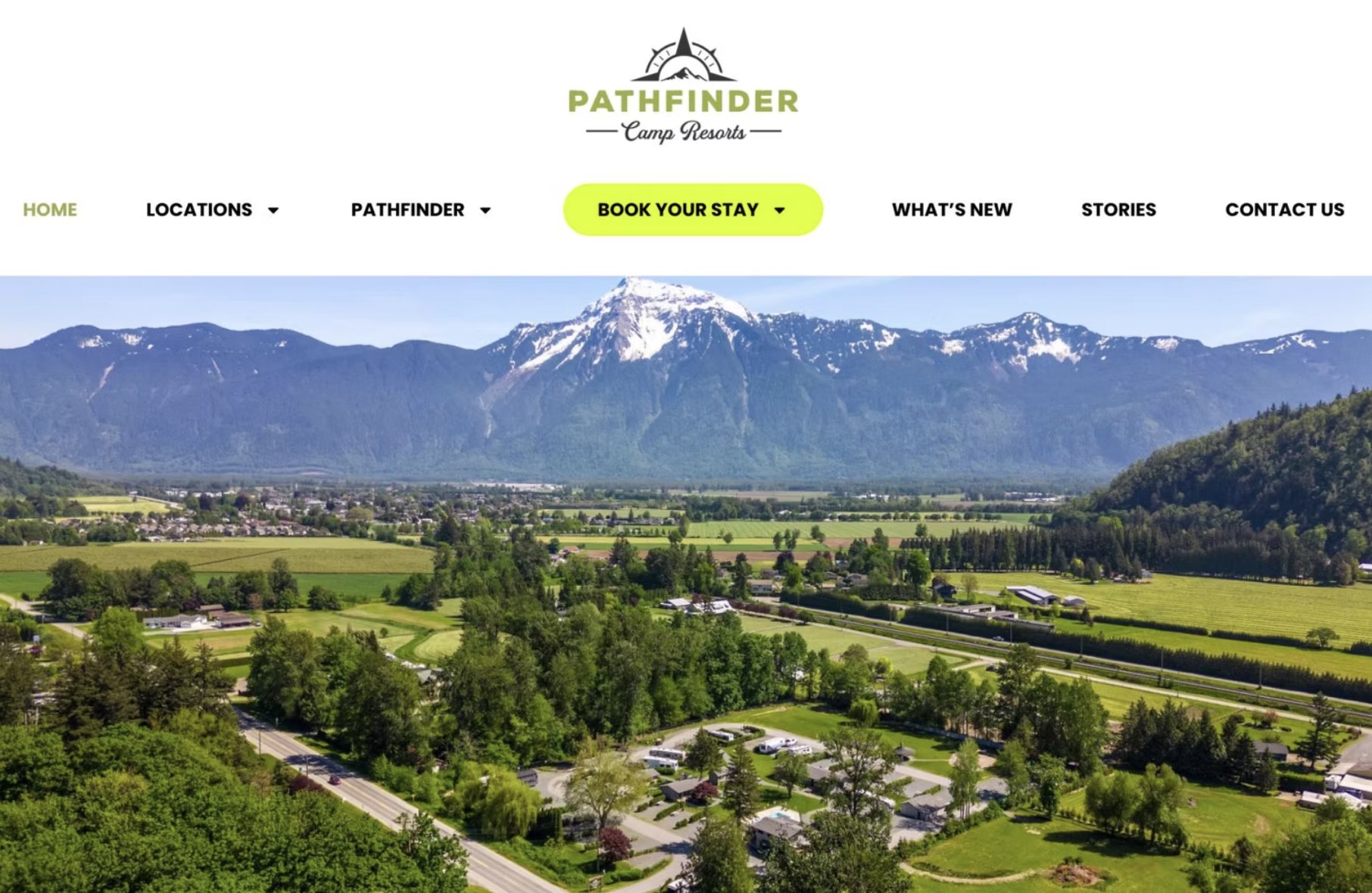 Pathfinder Camp Resorts website homepage with an aerial view of the campground and mountains
